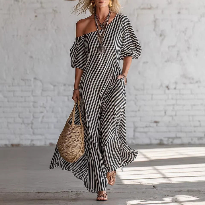 Avyra – Schulterfreies gestreiftes Maxikleid