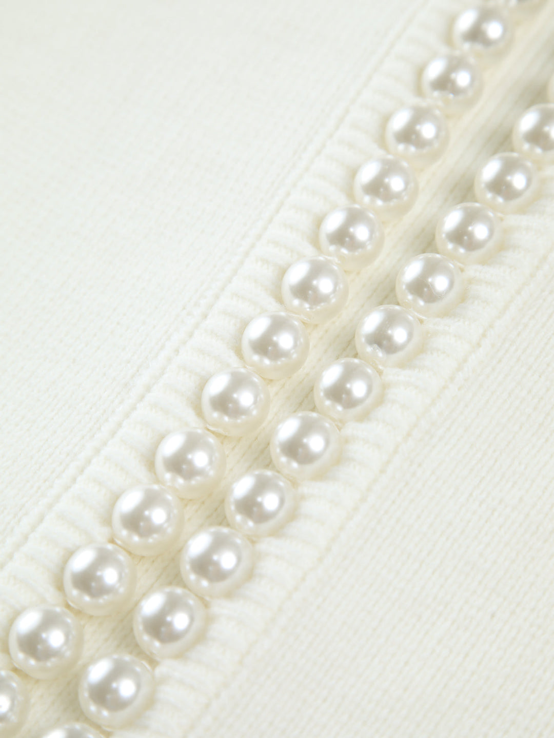 Virela – mit Perlenbesatz gestrickte Jacke