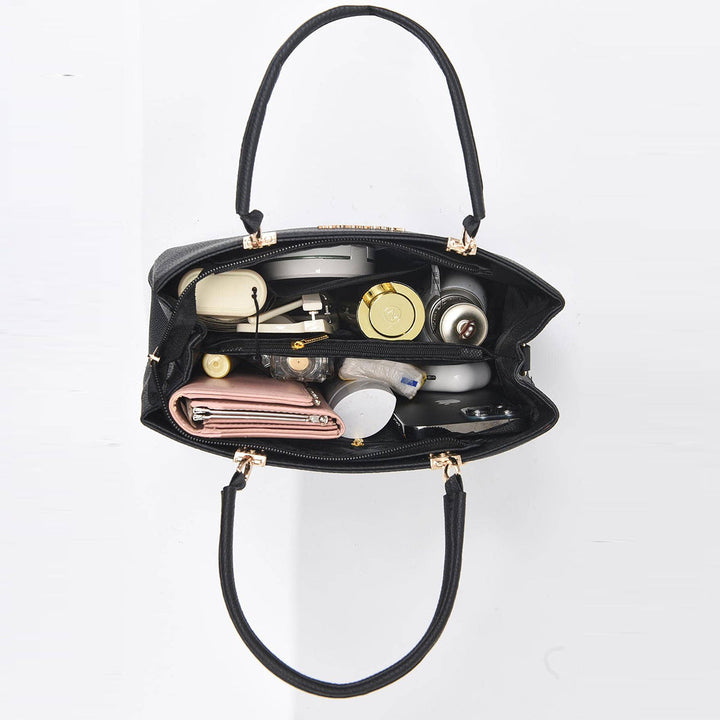 Nirela – schalenförmige, beschichtete Handtasche
