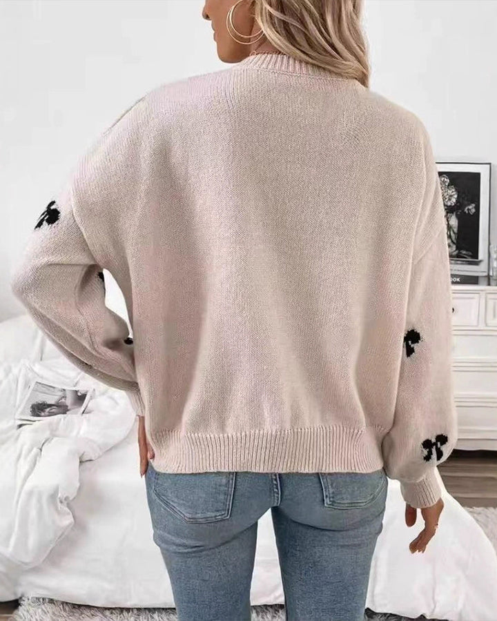 Novira – Allover-Schleifenmotiv-Strickpullover