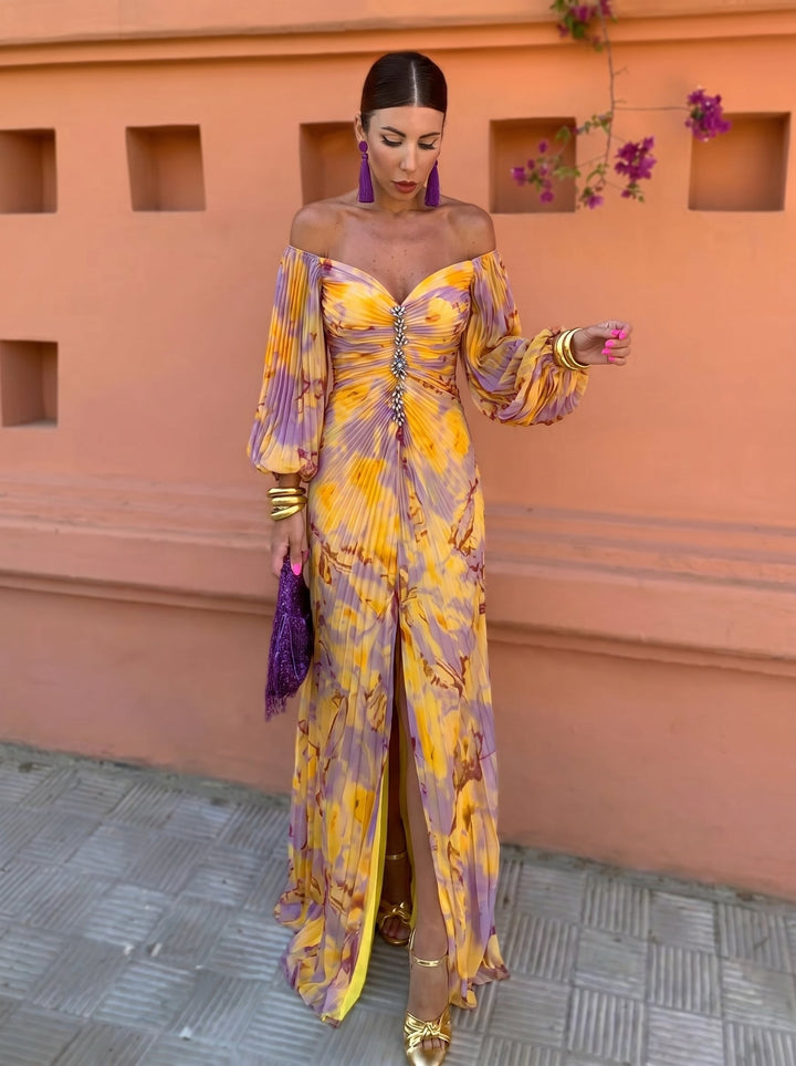 Nivara – Kleid mit floralem Druck und ausgeschnittenem Dekolleté