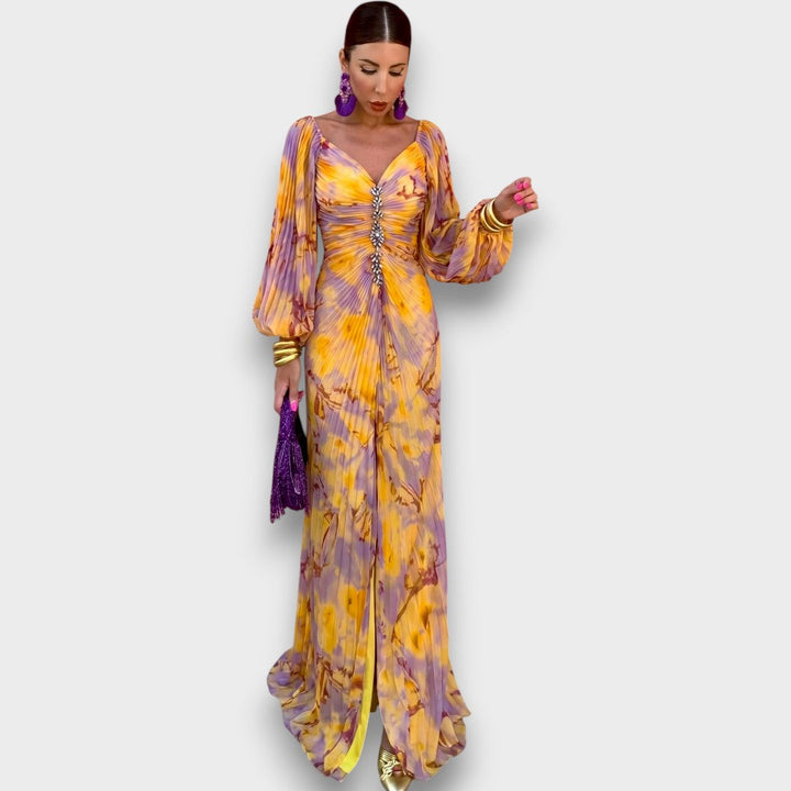 Nivara – Kleid mit floralem Druck und ausgeschnittenem Dekolleté