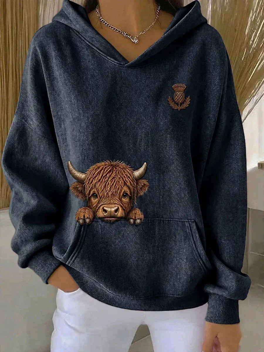 Sorali – Highland-Rind-Alloverdruck Strickkapuzenpullover