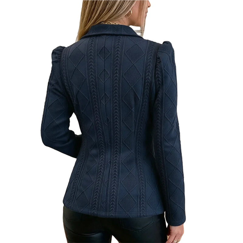 Vesara – Skulptural geformte Taille, geometrisch strukturierter Blazer