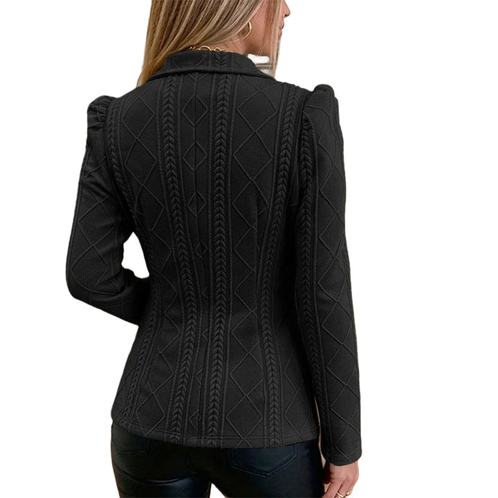 Vesara – Skulptural geformte Taille, geometrisch strukturierter Blazer